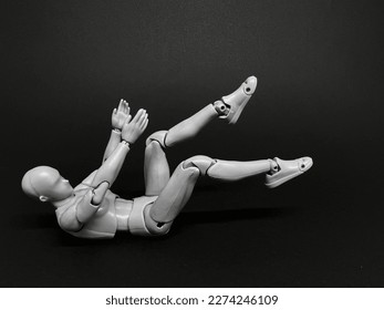 Doll falling from height from the back  concept accident 