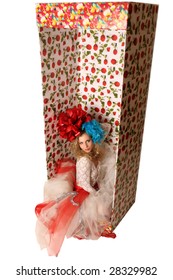 The doll in a gift box.