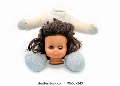 Doll Head And Body On A White Background