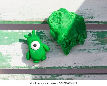 Doll Made With Green Fondant For Decorative Use In Pastry.