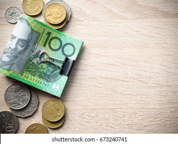 Dollar Australia Banknotes And Coins On Wooden Table With Copy Space For Money Concept.