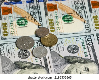 Dollar Banknotes And Coins. Lithuanian, Russian, Chinese Coins Lie On Dollar Banknotes.



