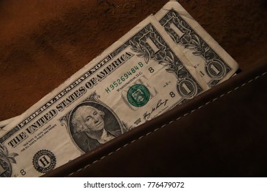 dollar banknotes on dark background