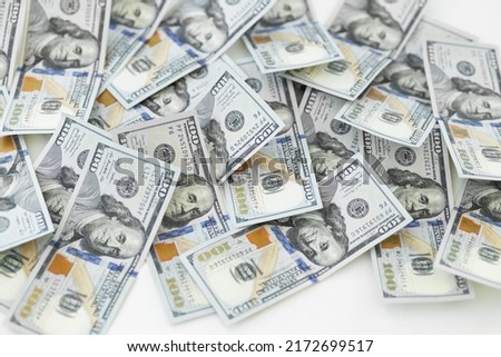 Dollar bills background. Pile of american money cash. One hundred usd dollars banknotes.