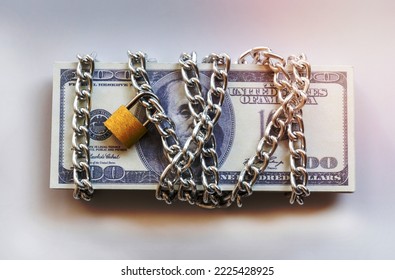 Dollar bills with chain and padlock, Safety money and investment concept. - Shutterstock ID 2225428925