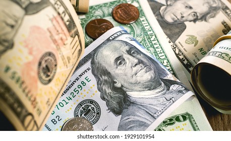 Dollar bills and coins scattered on the desk. Us Money - USD. Photography for Finance and Economy concepts. 
