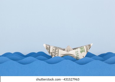 Dollar Boat Swimming On Paper Waves