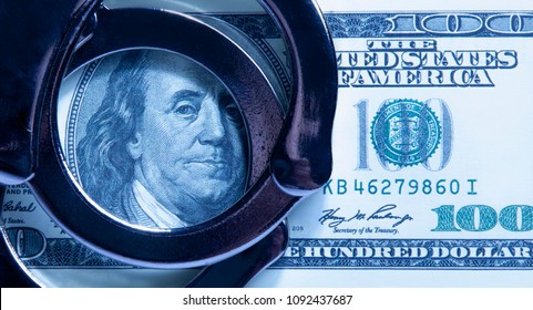 Dollar Cash And Handcuffs As Symbol Of Corruption In The Judicial System, Justice, Law, Bail, Crime, Bribing And Fraud. 