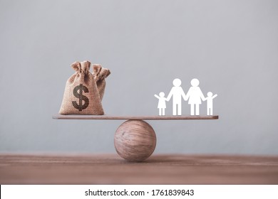 Dollar Or Cash In Hemp Bags Or Burlap Sacks And Family Member On Wood Balance Scale. Money Saving For Kids, Family Financial Wealth Management Concept.