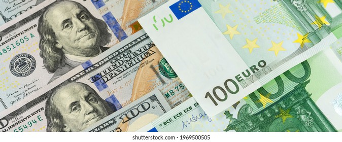 Dollar euro banner background banknotes of hundred bills. American US and European EU cash - Shutterstock ID 1969500505