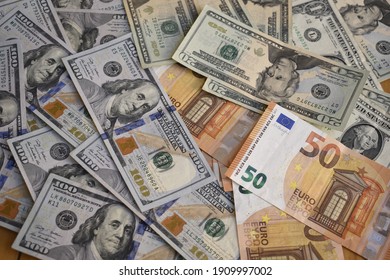 dollar and euro bills in disarray