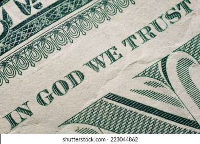 Dollar Macro Closeup Detail Phtoto. In God We Trust Sentence Visible. One Dollar Bill Fragment. U.S. Treasury. 