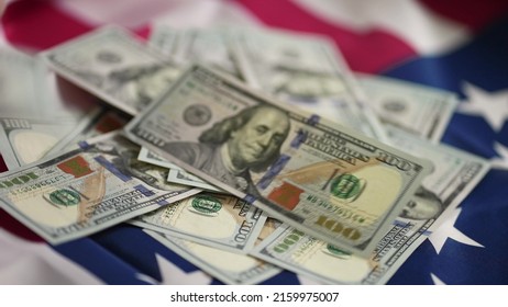 dollar money and American flag. bankrupt man counting money cash. business crisis finance dollar concept. usd close-up of a hand counting paper dollars. exchange finance economy dollar pay tax - Shutterstock ID 2159975007
