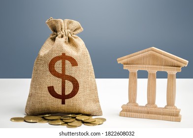 Dollar Money Bag And Bank / Government Building. Budgeting, National Financial System. Lending Loans, Placing Deposits. Monetary Policy. Support Businesses In Times Of Crisis. Resource Allocation.