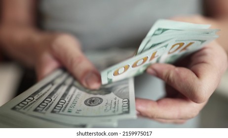 dollar money. bankrupt man counting money cash. business crisis finance lifestyle dollar concept. close-up of a hand counting paper dollars. exchange finance economy dollar usd