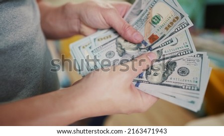 dollar money. bankrupt man counting money cash. business crisis finance dollar concept. close-up of a hand counting paper dollars. exchange finance economy dollar usd pay tax
