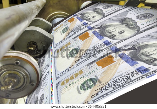 Dollar money offset\
printing press running