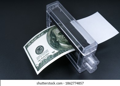 Dollar Money Printing Machine On A Black Background. Business Finance Concept, Counterfeiting, Bank Fake Banknote