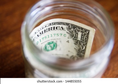Dollar Note In Jar. Money Saving And Finance Concept. US Dollars Currency