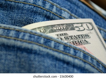 dollars in back pocket of jeans