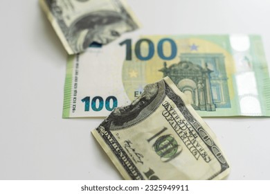 Dollars bill torn as background.