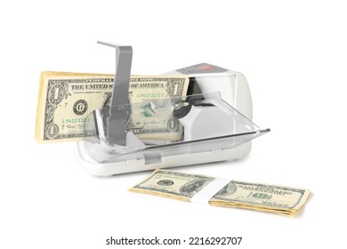 Dollars And Currency Counting Machine On White Background