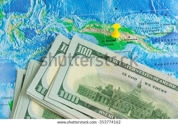 Dollars on a background\
map
