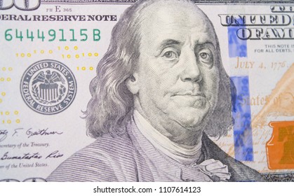 dollars on a blue background - Shutterstock ID 1107614123