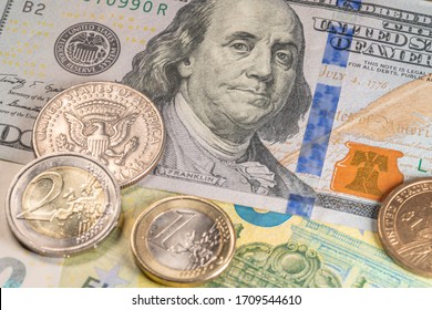 Dollars, USD And Euros EUR Currency, Coins And Banknotes Of European And American Money. One Hundred Euro And Dollar Bills