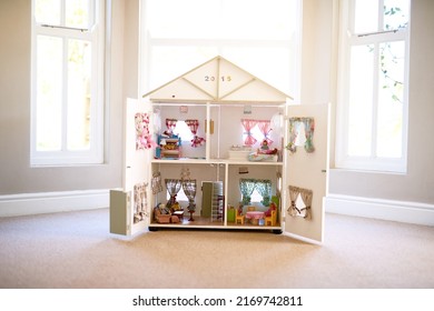 The Dolls Home. Shot Of A Dollhouse In An Empty Room.