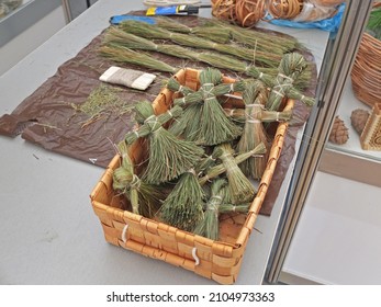 Dolls Made Of Herbs Lying In A Woven Birch Bark Box