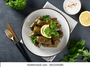 Dolma On A Dark Background. Traditional Caucasian, Turkish And Greek Cuisine, Top View