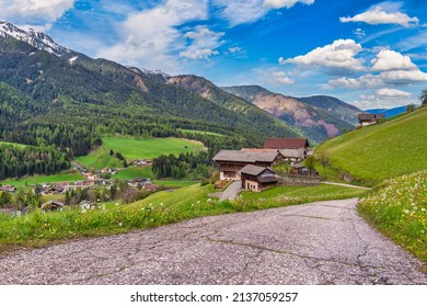 Dolomites Alps mountain landscape at Santa Maddalena village with walk path, St. Magdalena Italy