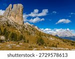 Dolomites mountain views with dramatic limestone peaks, alpine ridges, and wide valleys in northern Italy. High altitude landscape showing distinctive geology, European Alps scenery, outdoor travel destination, hiking and climbing area, natural environment, and panoramic mountain background