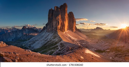 Dolomites, Three Peaks of Lavaredo. Panoramic image of Italian Dolomites with famous Three Peaks of Lavaredo (Tre Cime di Lavaredo) South Tyrol, Italy, Europe at summer sunset.