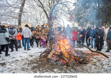 DOLOVO, SERBIA , JANUARY 06 2019 : Christmas Eve Yule Log Fire. Orthodox Church Christmas Liturgy