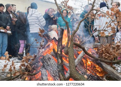 DOLOVO, SERBIA , JANUARY 06 2019 : Christmas Eve Yule Log Fire. Orthodox Church Christmas Liturgy