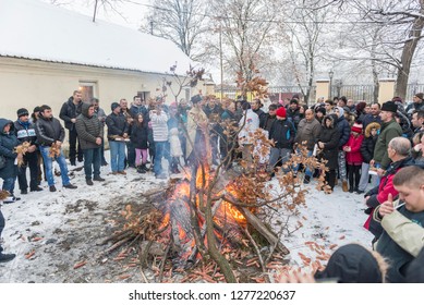 DOLOVO, SERBIA , JANUARY 06 2019 : Christmas Eve Yule Log Fire. Orthodox Church Christmas Liturgy