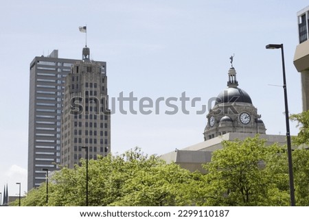 The dome of the Allen County Clerk's Building rises above the treetops in downtown Fort Wayne, Indiana.
