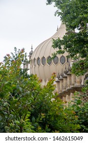 Dome Of Brighton Pavillion Through Trees