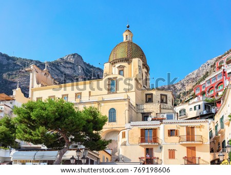 Dome of the Church of Santa Maria Assunta at Positano town in autumn, Amalfi coast, Italy