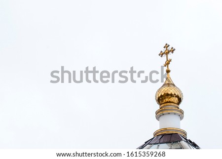 The dome and cross of the Russian Orthodox Church.