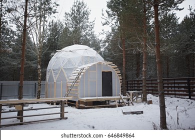 Dome house in forest. Geodesic architecture. Construction of a frame house. - Powered by Shutterstock