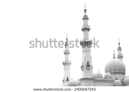 The dome and minaret of the mosque are isolated over a white background