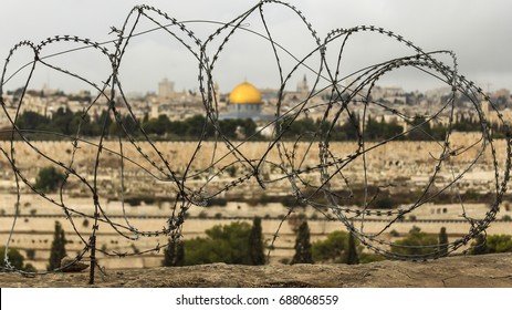 Dome of the Rock through barbed wire in Old Jerusalem, Israel. - Powered by Shutterstock