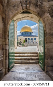 DOME OF THE ROCK VIEWED THROUGH THE COTTON MERCHANT'S GATE, JERUSALEM, ISRAEL JUNE 10 2015:  Unidentified tourists visit the Muslim shrine that can be accessed through eleven gates.
