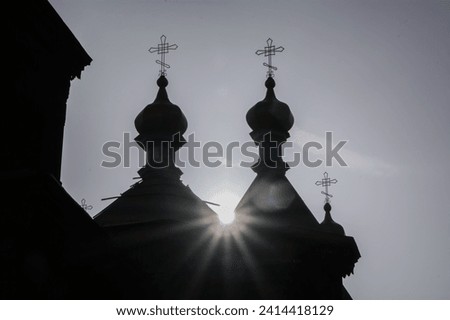 Domes and crosses of an Orthodox church in the sun