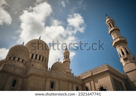 Domes and minarets of mosque low angle view. Abu al-Abbas al-Mursi Mosque in Alexandria, Egypt