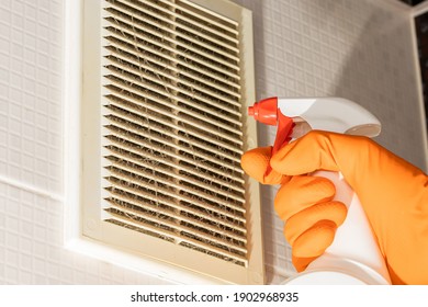 Domestic Dirty Air Ventilation Grid Cleaning. Person Dusting Air Duct.