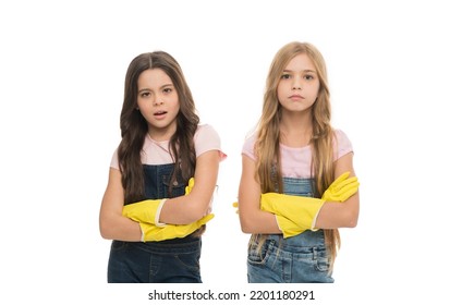 Domestic Services. Adorable Domestic Helpers. Cute Little Girls Wearing Yellow Rubber Gloves For Domestic Help. Small Children Tired Of Maintaining The Domestic Household